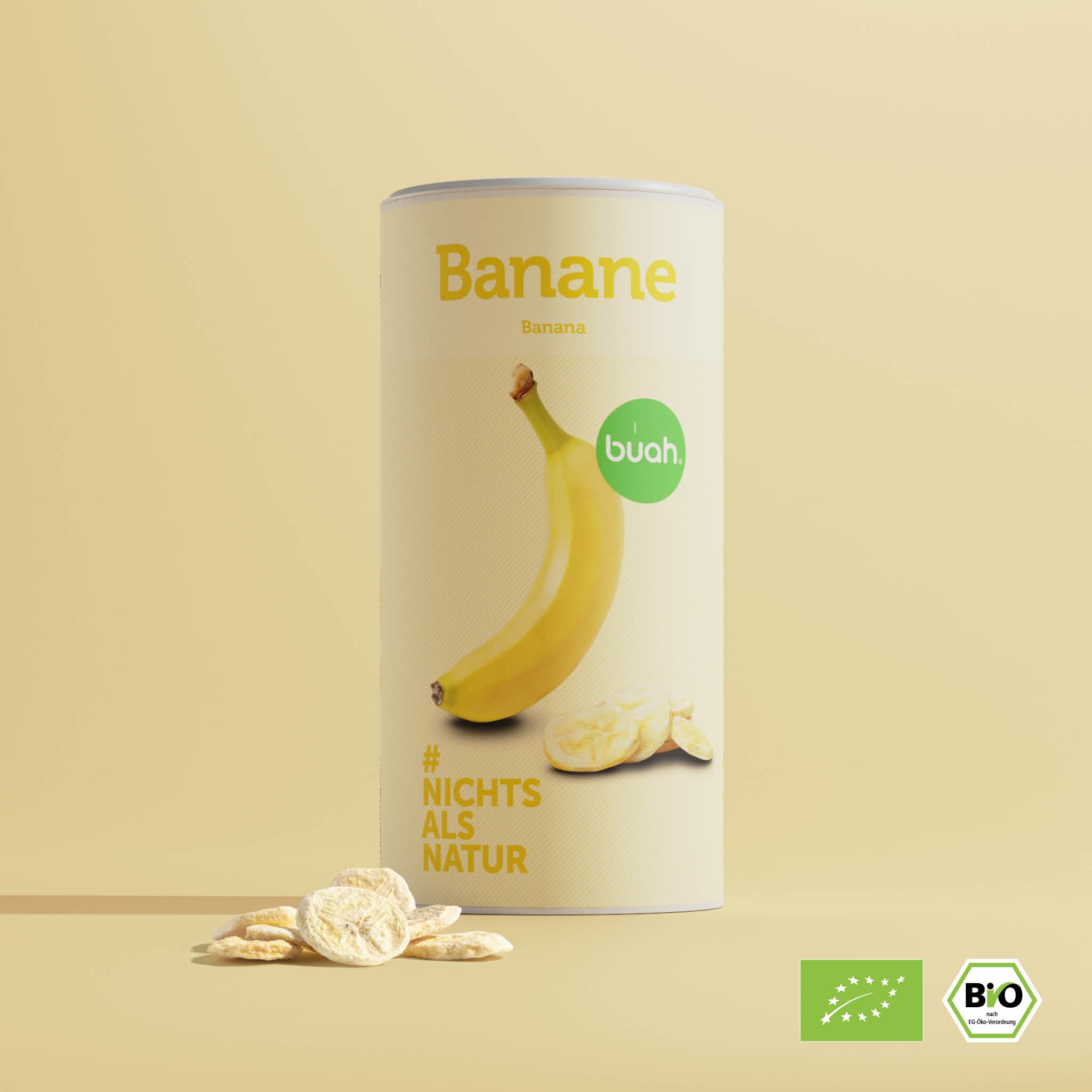 buah grosse boîte de banane avec quelques chips de banane lyophilisées devant la boîte