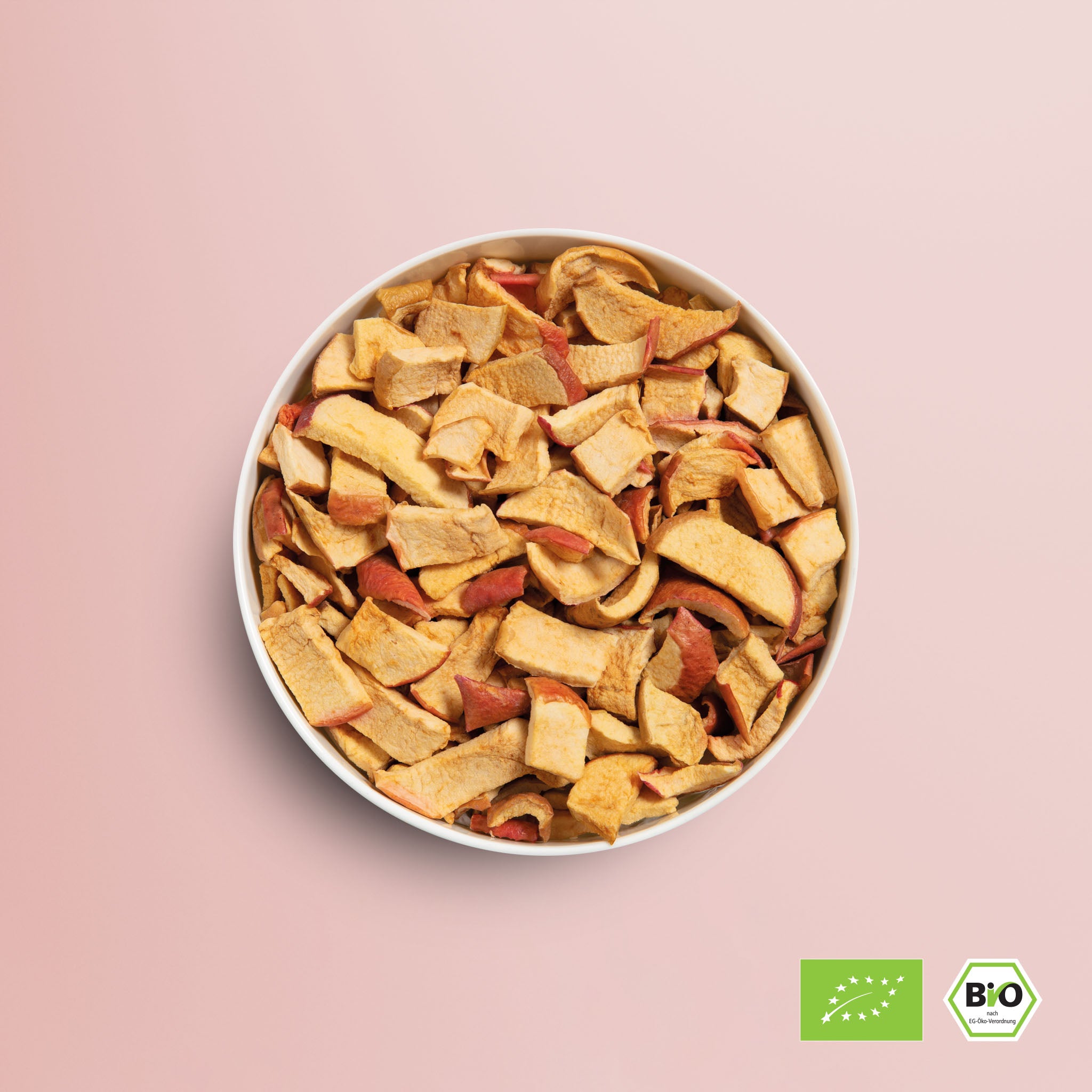 buah vakuumgetrockneter Apfel in einer Schale