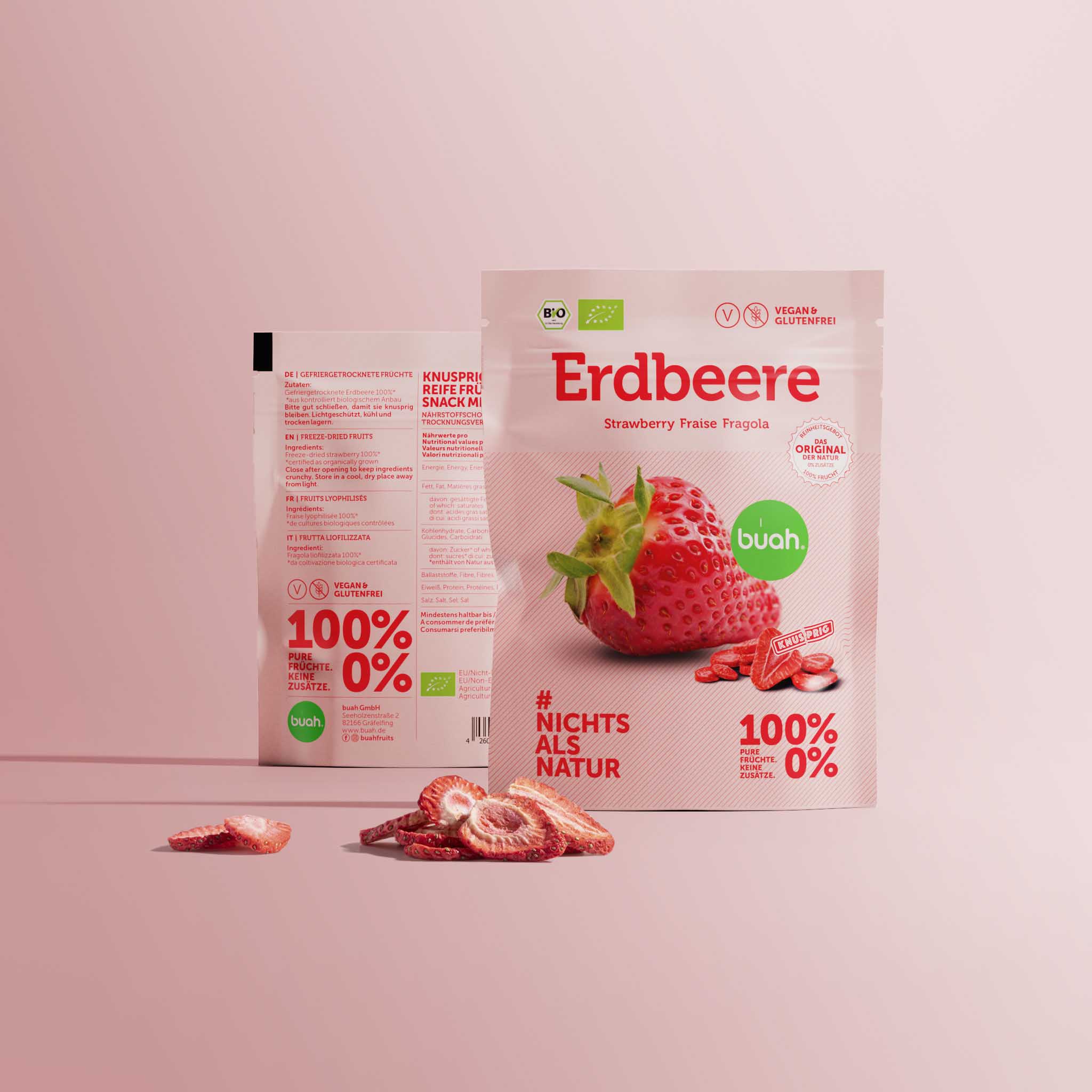 bouh Coffret snack Fraise avec un petit tas de fraises lyophilisées au premier plan