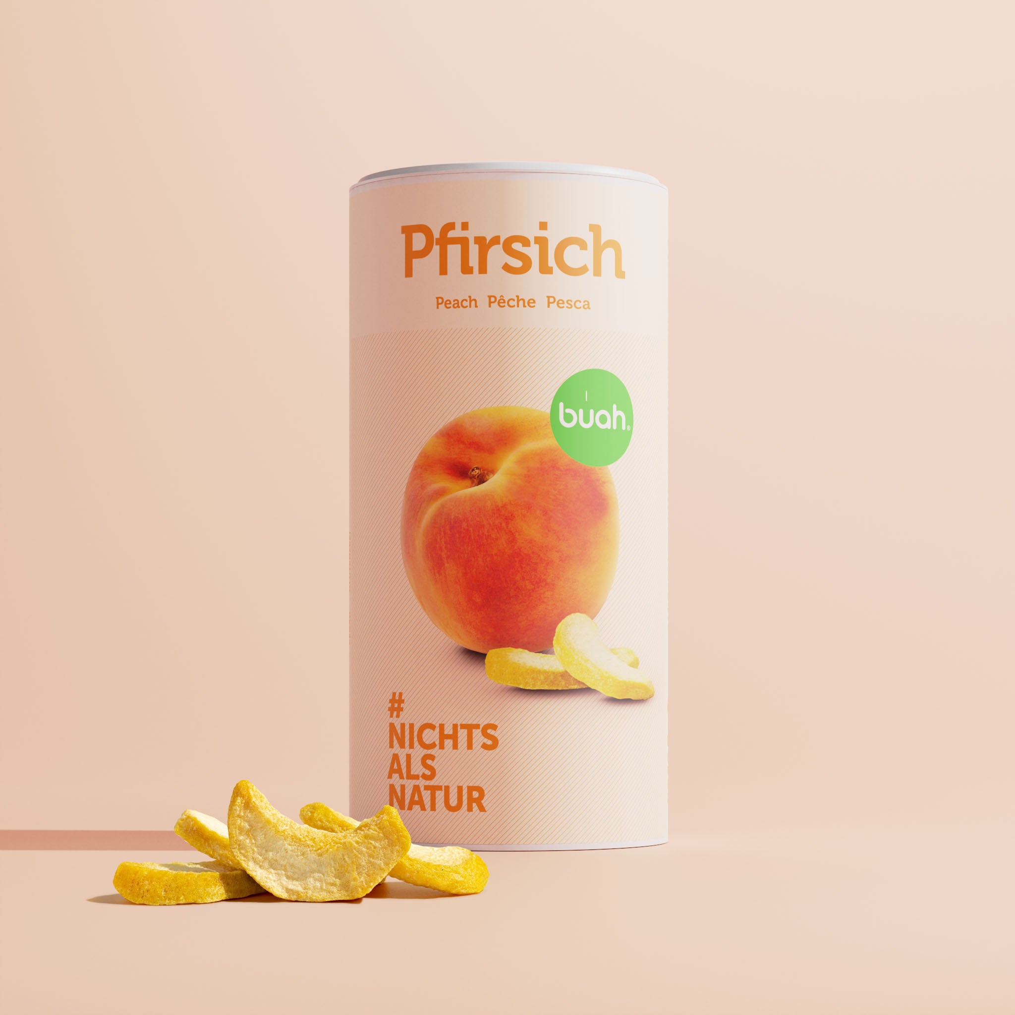 Boîte cylindrique de pêche buah avec sculptures de pêches lyophilisées devant la boîte