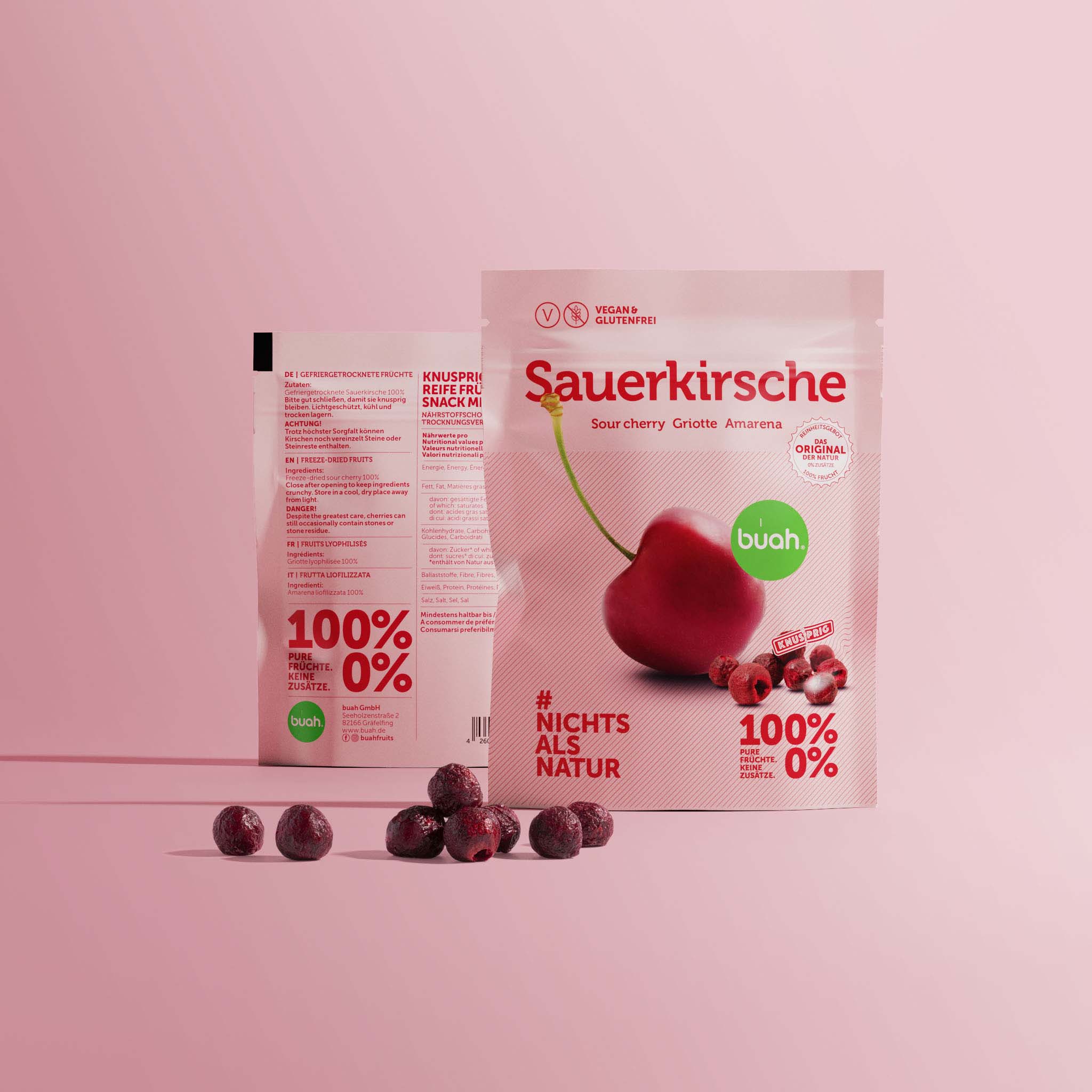 buah cerises aigres dans Coffret snack avec des griottes posées devant le paquet