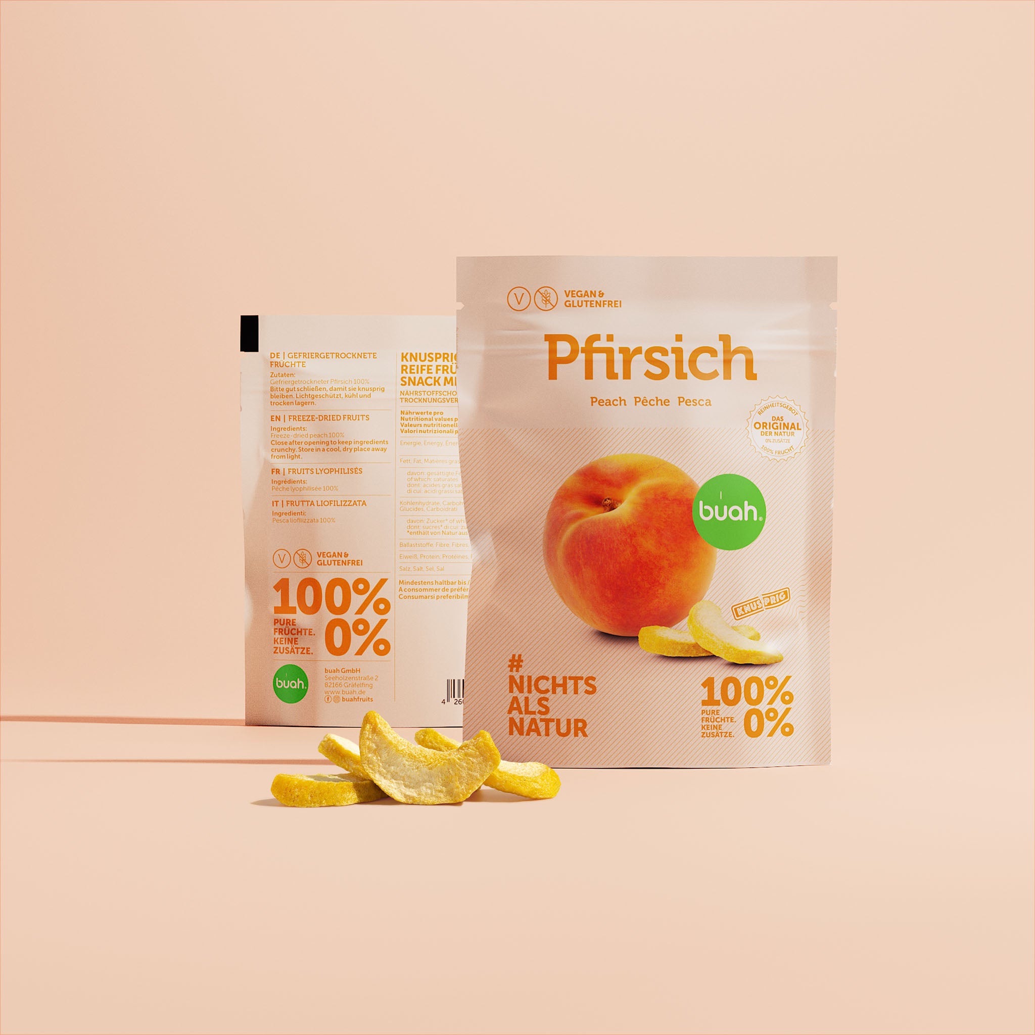 bouh Coffret snack Pêche avec un petit tas de pêches lyophilisées au premier plan