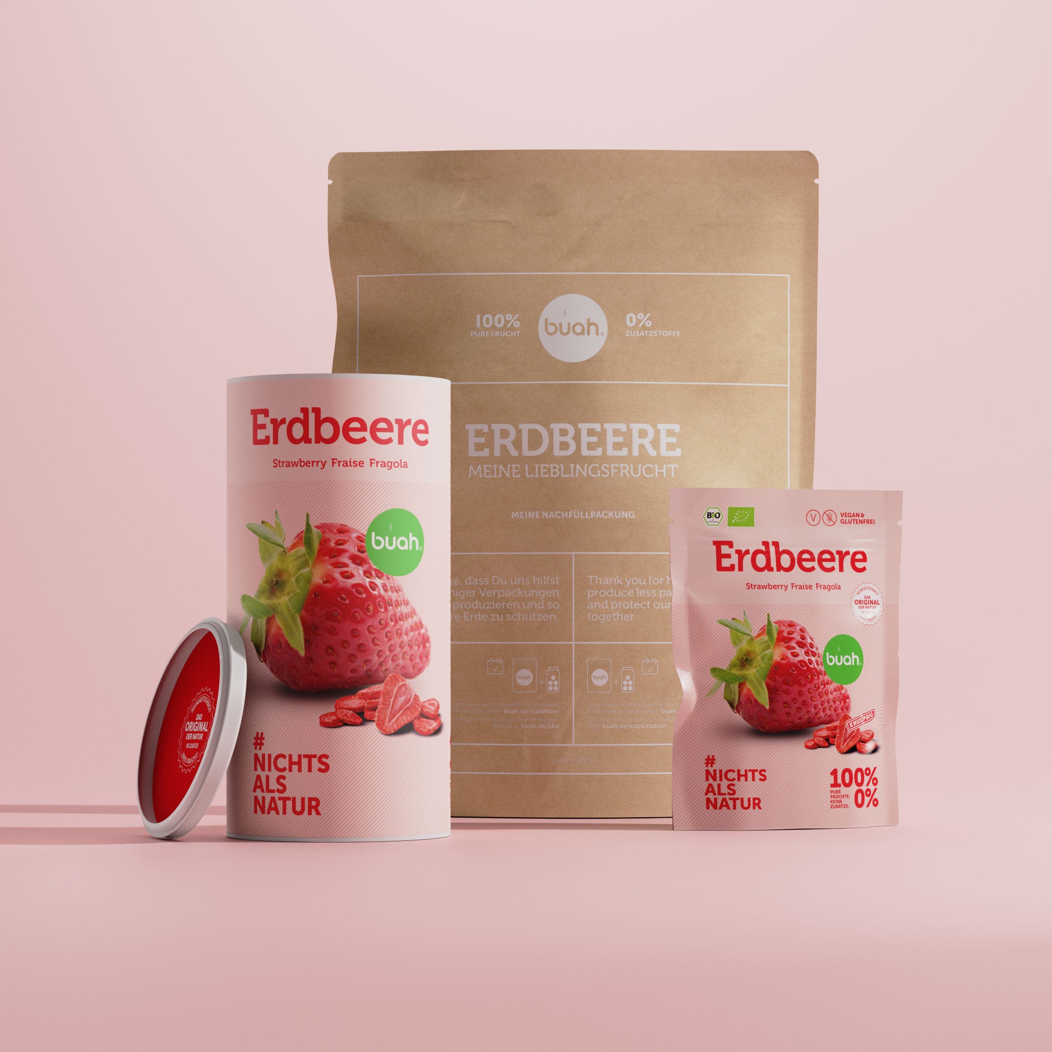 buah gefriergetrocknete Erdbeeren im Snackpack, der Dose und der Refill Packung nebeneinander