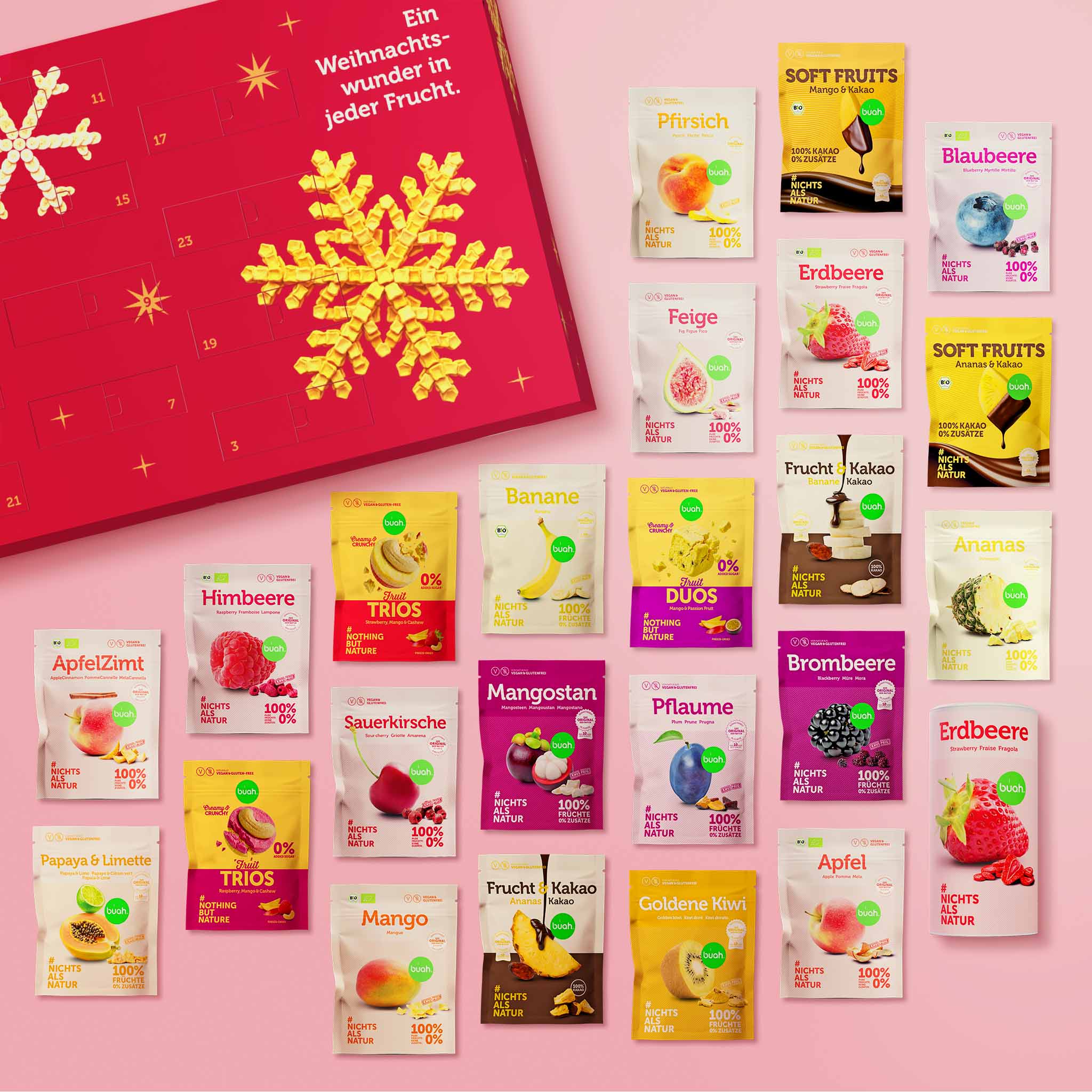 buah Adventskalender mit gefriergetrockneten Früchten, umgeben von 24 verschiedenen Fruchtsnacks und "Soft Fruits"